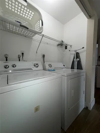 a utility room with dryer and washer