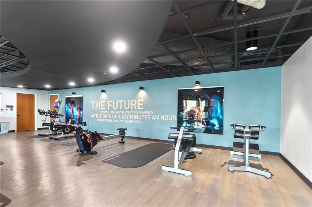 361 17th Street Northwest, Unit 1906 Atlanta, GA 30363 - Photo 20 of 28 a view of a room with gym equipment