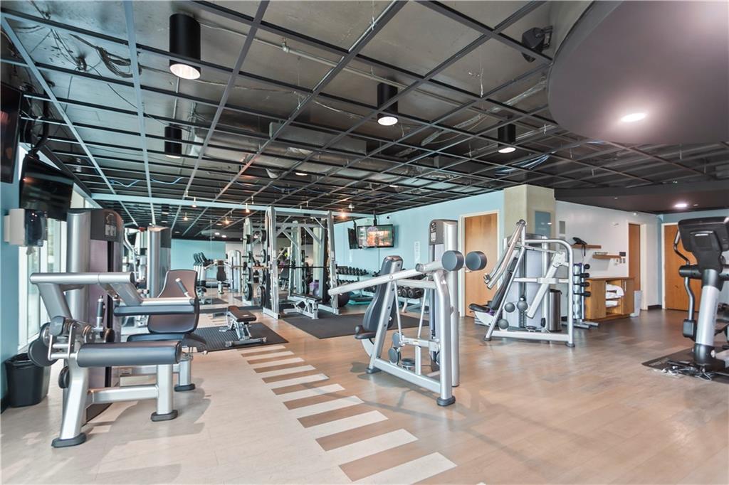 361 17th Street Northwest, Unit 1906 Atlanta, GA 30363 - Photo 22 of 28 a view of a room with gym equipment