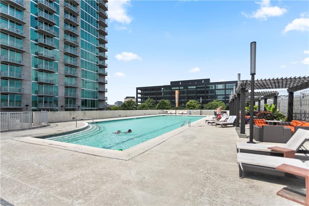 361 17th Street Northwest, Unit 1906 Atlanta, GA 30363 - Photo 25 of 28 a view of a terrace with chairs