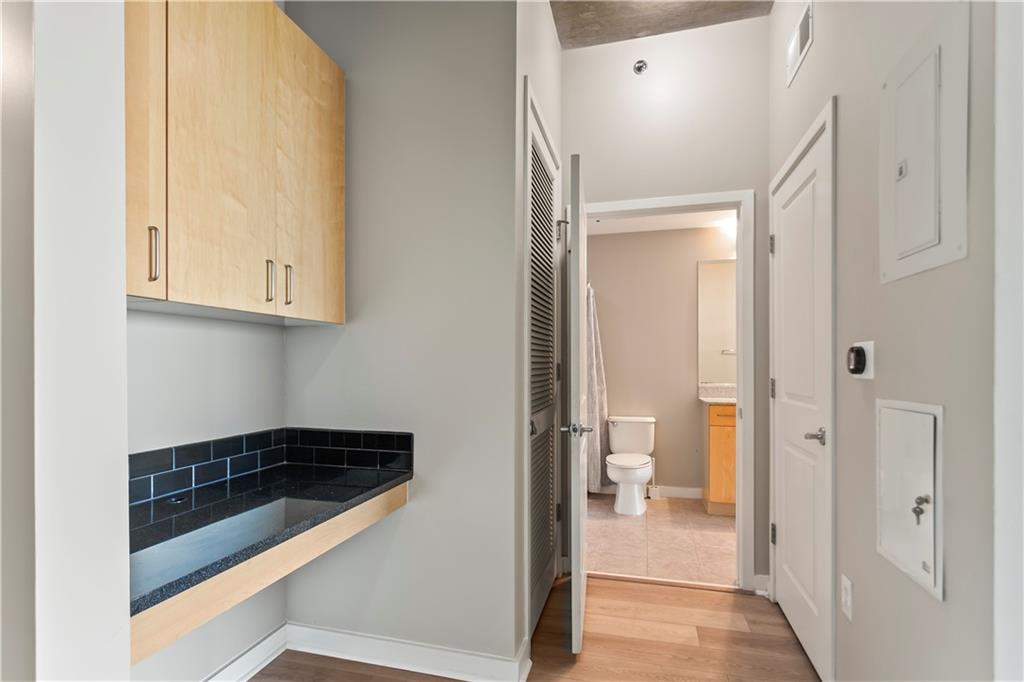 361 17th Street Northwest, Unit 1906 Atlanta, GA 30363 - Photo 8 of 28 a bathroom with a sink and a mirror