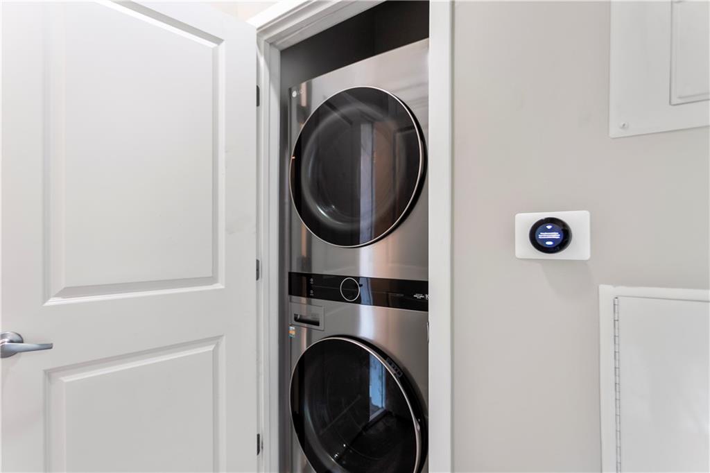 361 17th Street Northwest, Unit 1906 Atlanta, GA 30363 - Photo 9 of 28 a utility room with dryer and washer