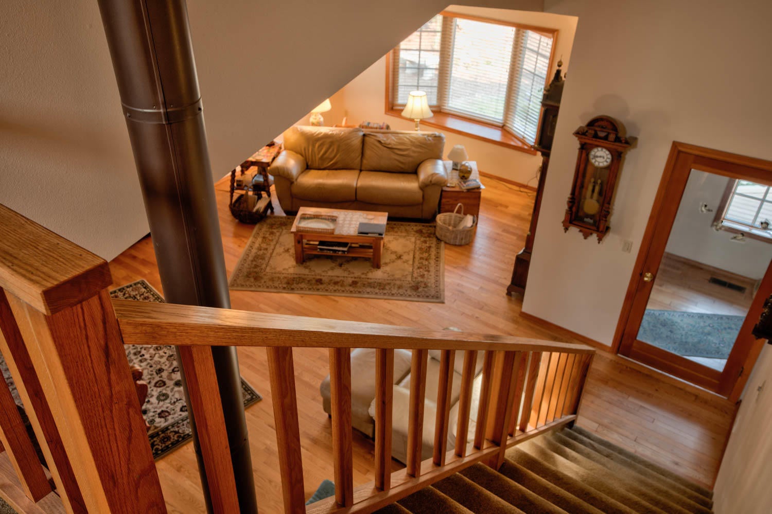 64548 Joe Neil Road Bend, OR 97701 - Photo 23 of 50 Living Room from 2nd Story Landing