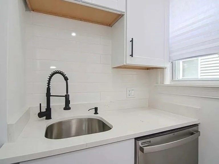 27 Hosmer Street, Unit 2 Boston, MA 02126 - Photo 3 of 20 a kitchen with a sink and cabinets