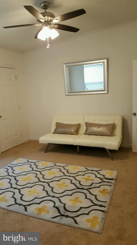 7743 Normandy Road Landover, MD 20785 - Photo 12 of 15 a view of a room with wooden floor