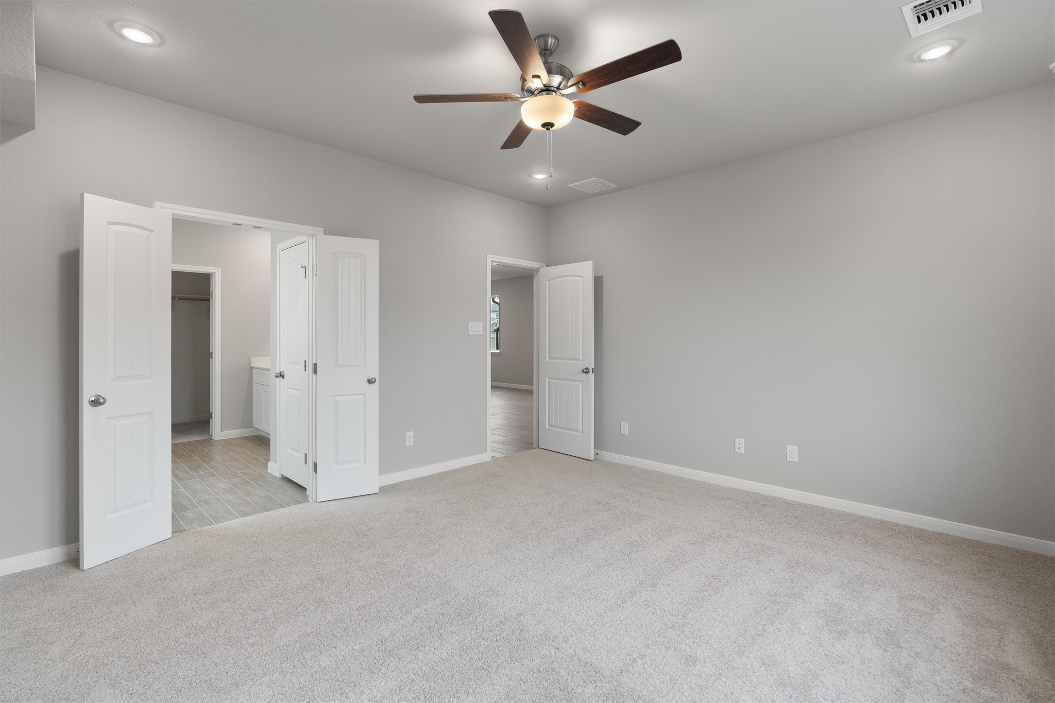 340 Stellar Wind Drive Georgetown, TX 78628 - Photo 14 of 31 en empty room with fan and a ceiling fan