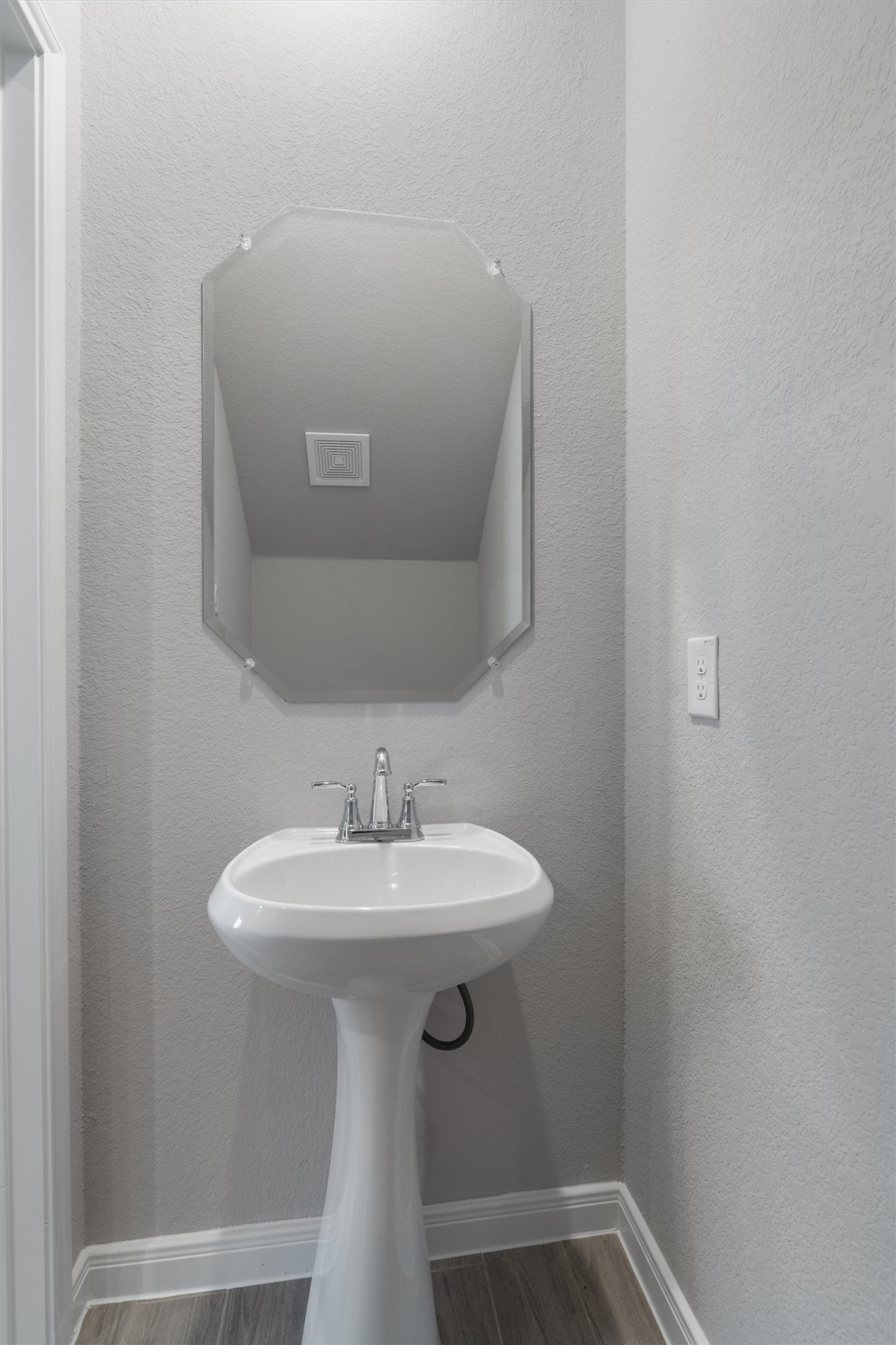 340 Stellar Wind Drive Georgetown, TX 78628 - Photo 19 of 31 a bathroom with a sink toilet and mirror