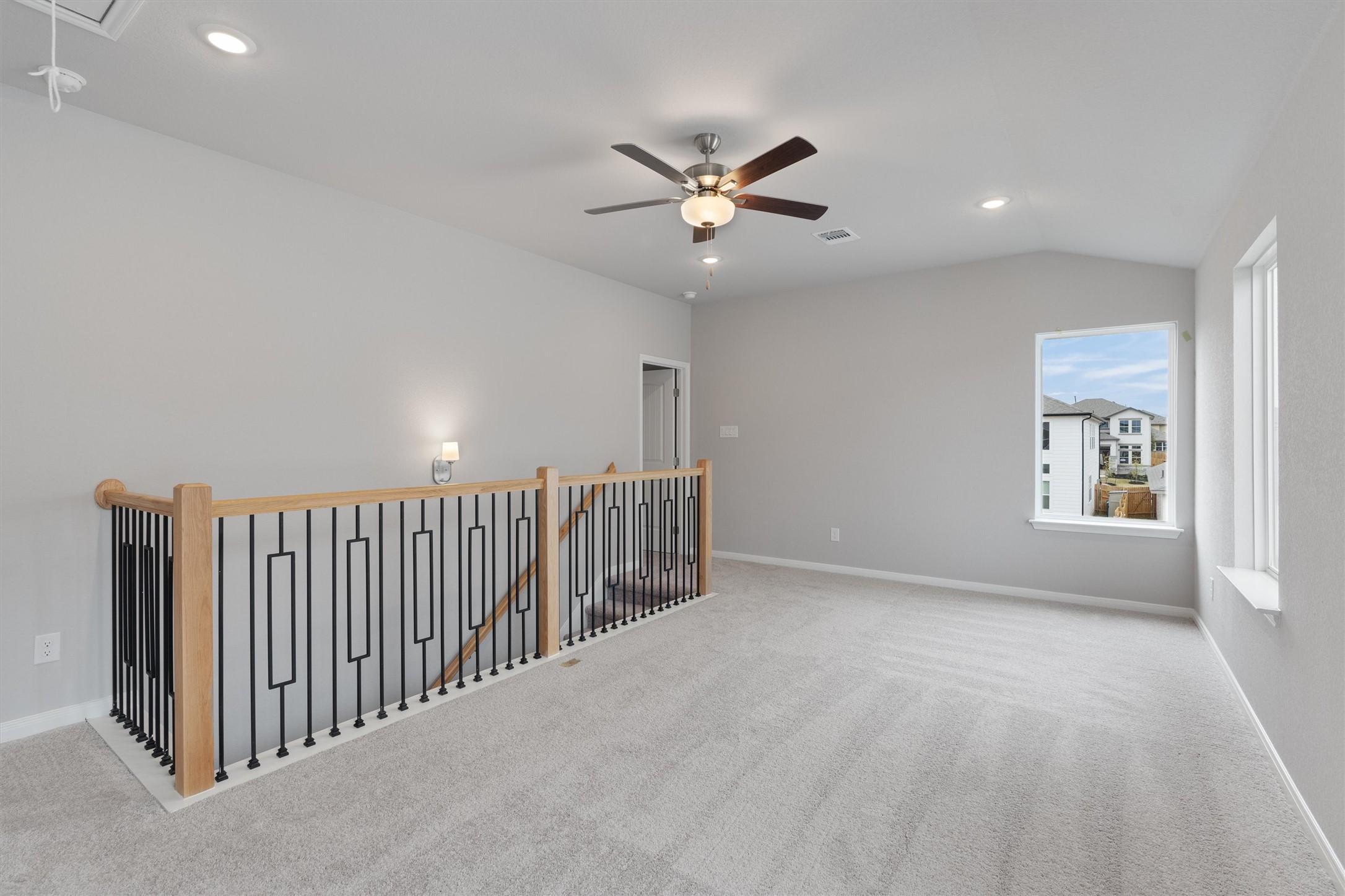 340 Stellar Wind Drive Georgetown, TX 78628 - Photo 21 of 31 a view of a hallway with windows