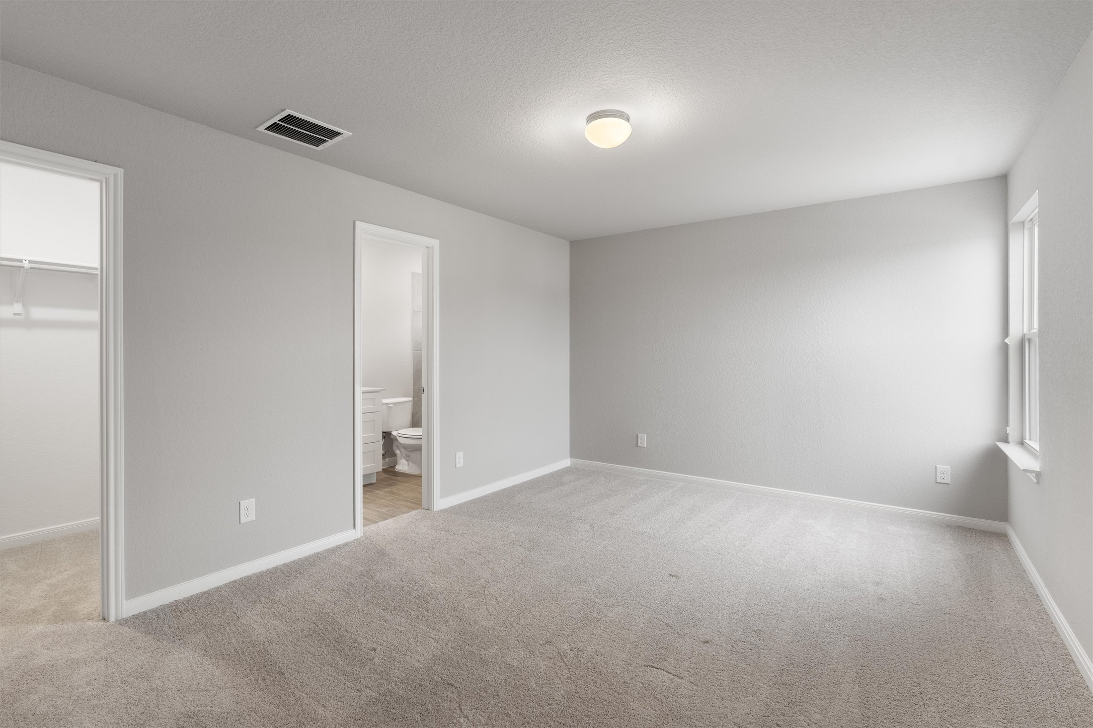 340 Stellar Wind Drive Georgetown, TX 78628 - Photo 22 of 31 a view of an empty room and a window