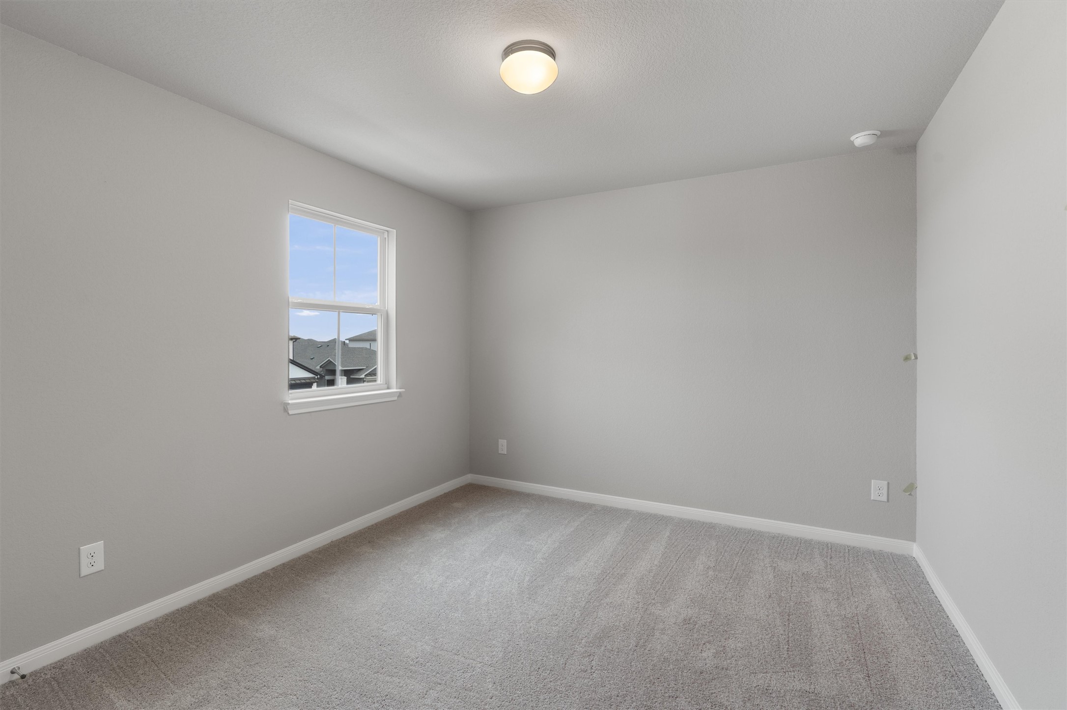 340 Stellar Wind Drive Georgetown, TX 78628 - Photo 26 of 31 an empty room with a window