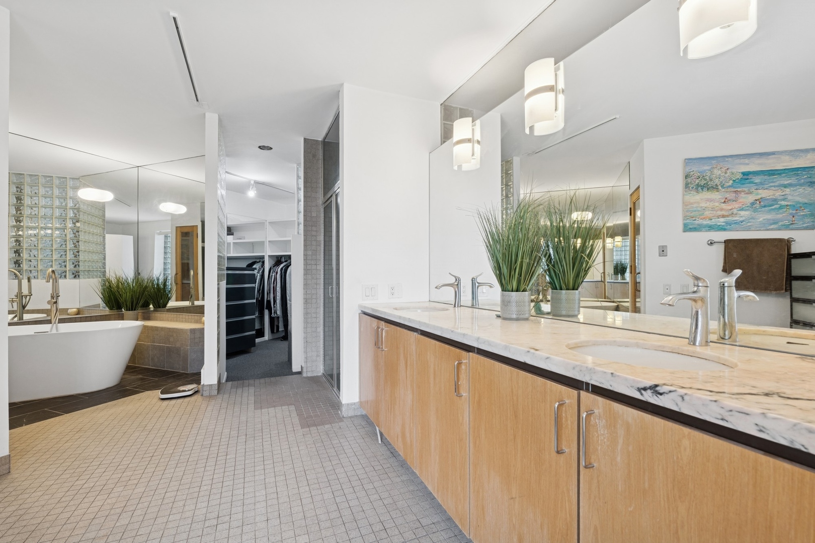 711 North Milwaukee Avenue, Unit 2 Chicago, IL 60642 - Photo 17 of 27 a large bathroom with a large tub and sink