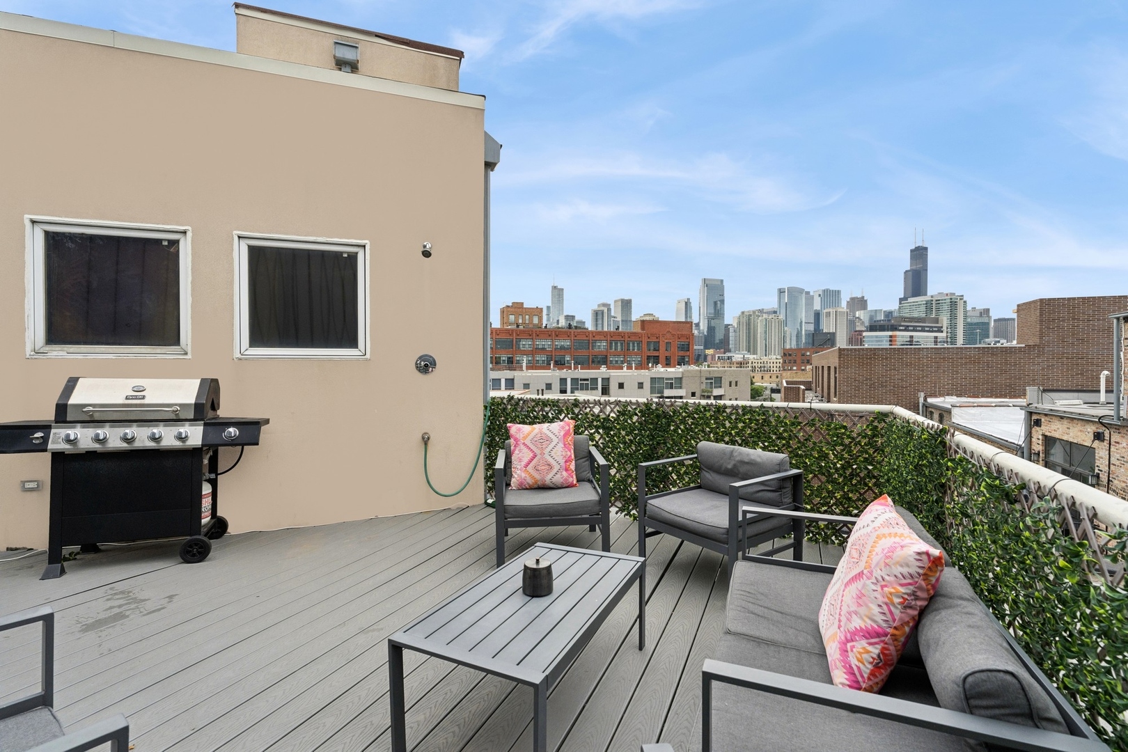 711 North Milwaukee Avenue, Unit 2 Chicago, IL 60642 - Photo 25 of 27 a view of a terrace with furniture