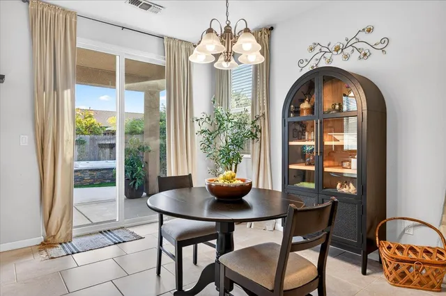 a kitchen with stainless steel appliances and cabinets