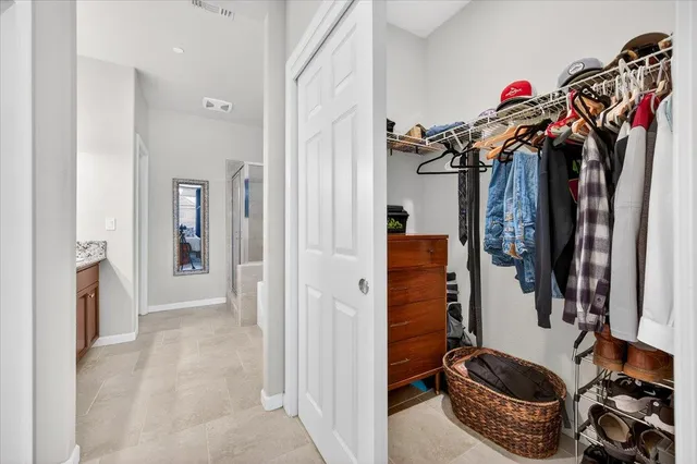 a view of a house with backyard porch and sitting area