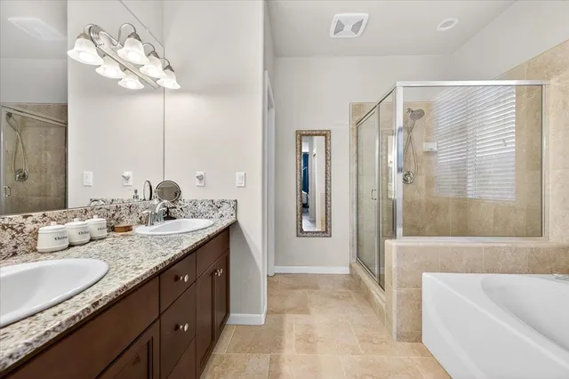 a view of a backyard with sitting area