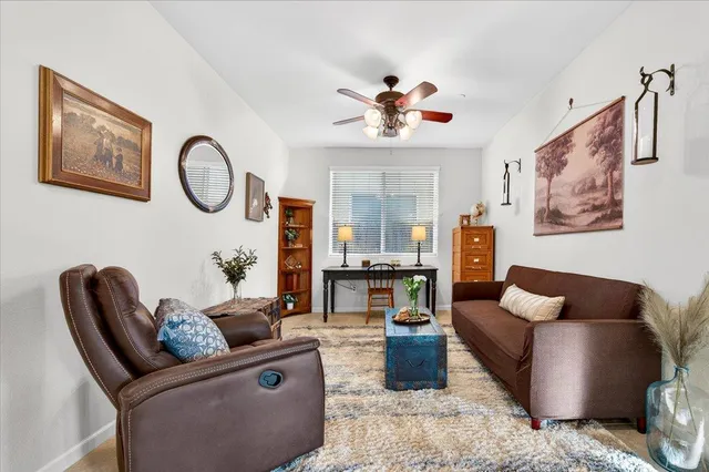 a kitchen with stainless steel appliances granite countertop a refrigerator and a stove
