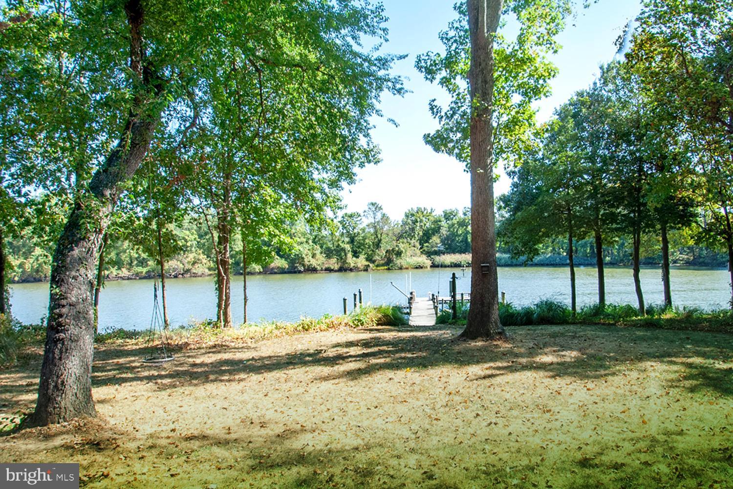 1749 Colbert Road Annapolis, MD 21409 - Photo 17 of 48 Rear Tree-Shaded Lawn Rolling to Water's Edge