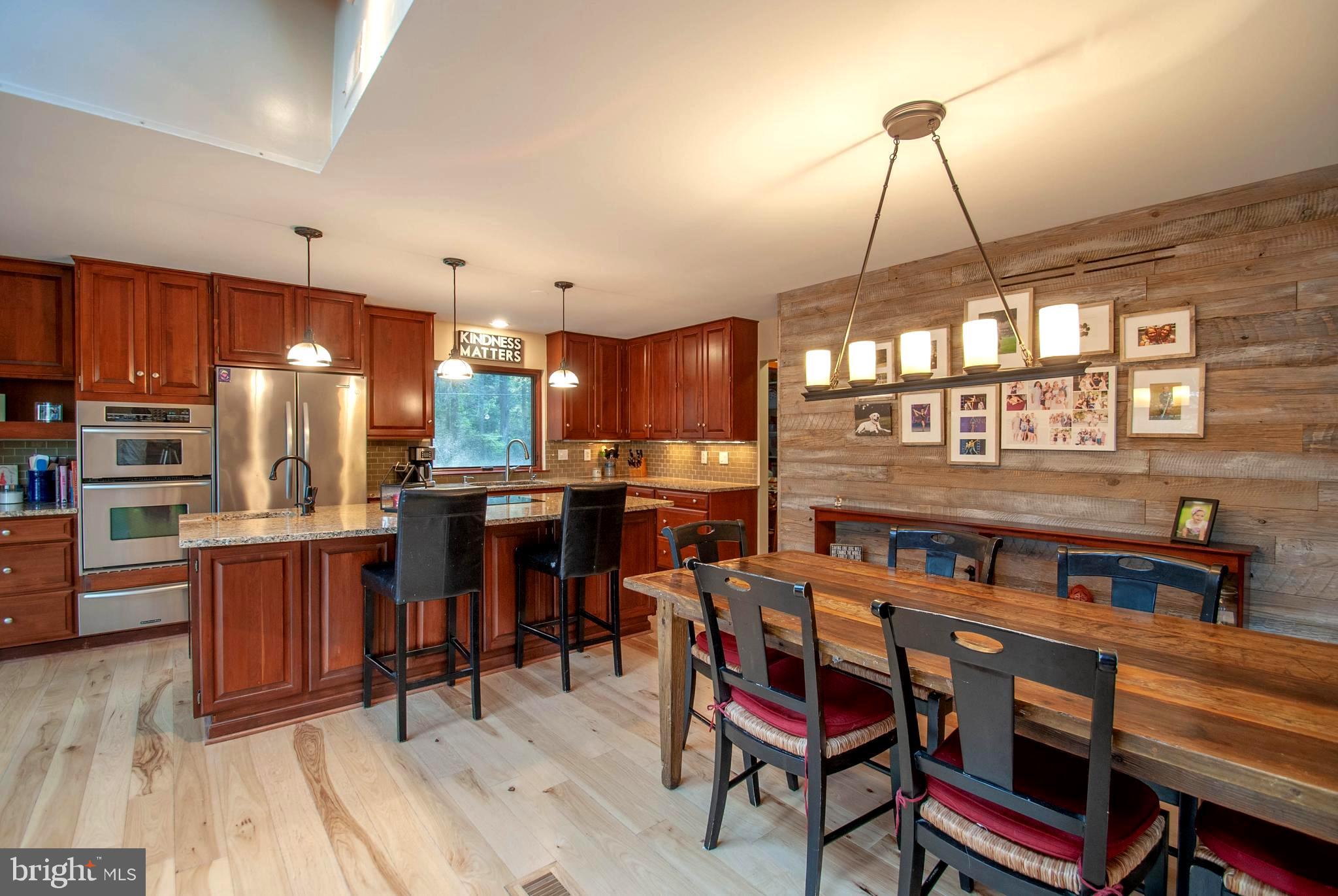 1749 Colbert Road Annapolis, MD 21409 - Photo 29 of 48 Dining Area with Artisan Globe Chandelier