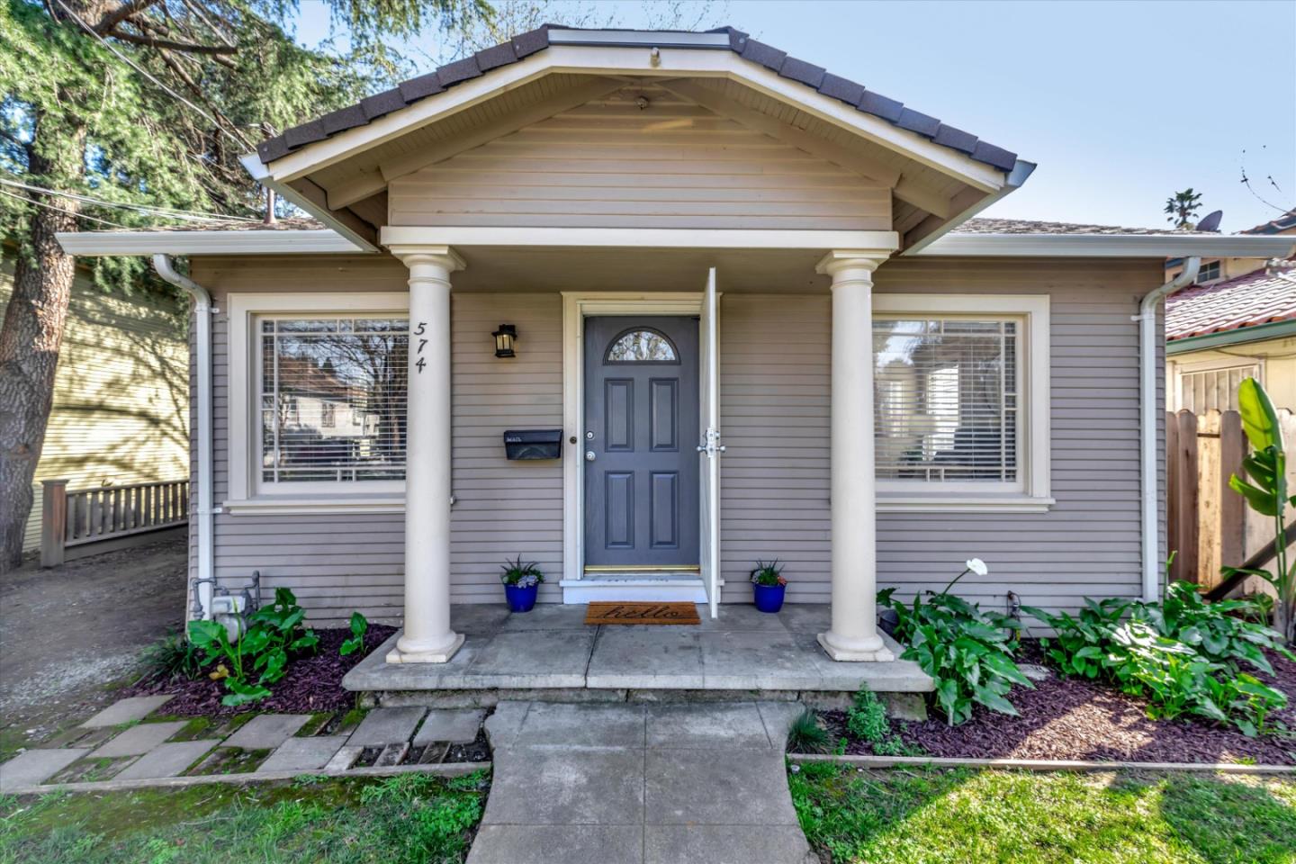 a front view of a house with a yard