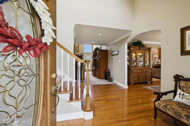 a living room with furniture a window and a fireplace