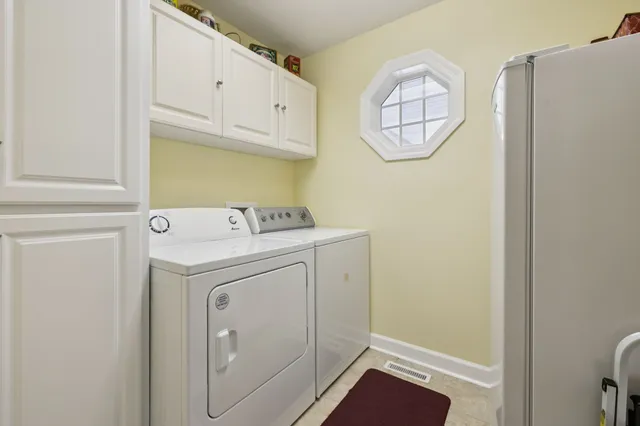 a view of hallway with wooden floor
