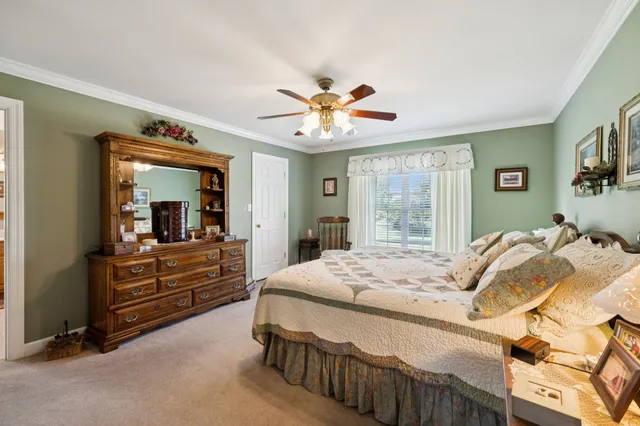 a view of hallway with wooden floor