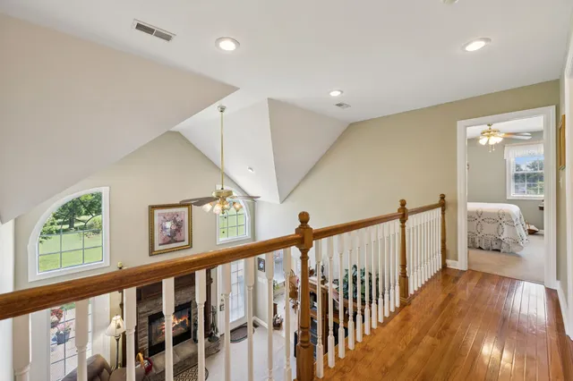 an aerial view of a residential houses with outdoor space