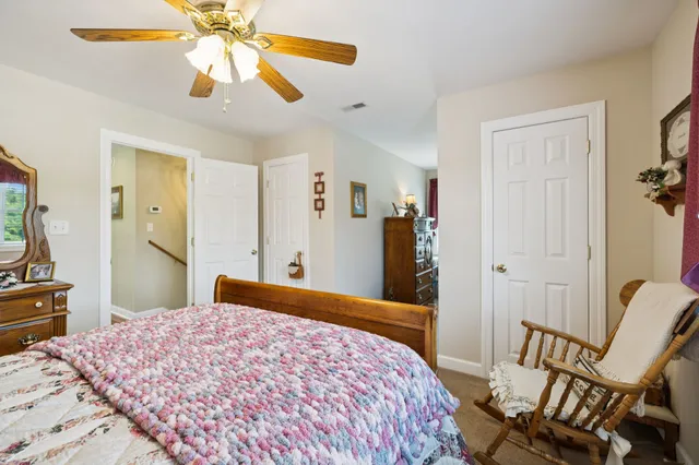an aerial view of a house with a swimming pool