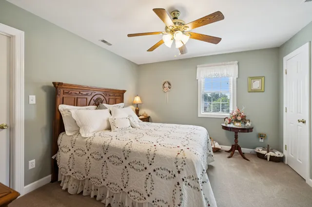 a view of a lake with a yard