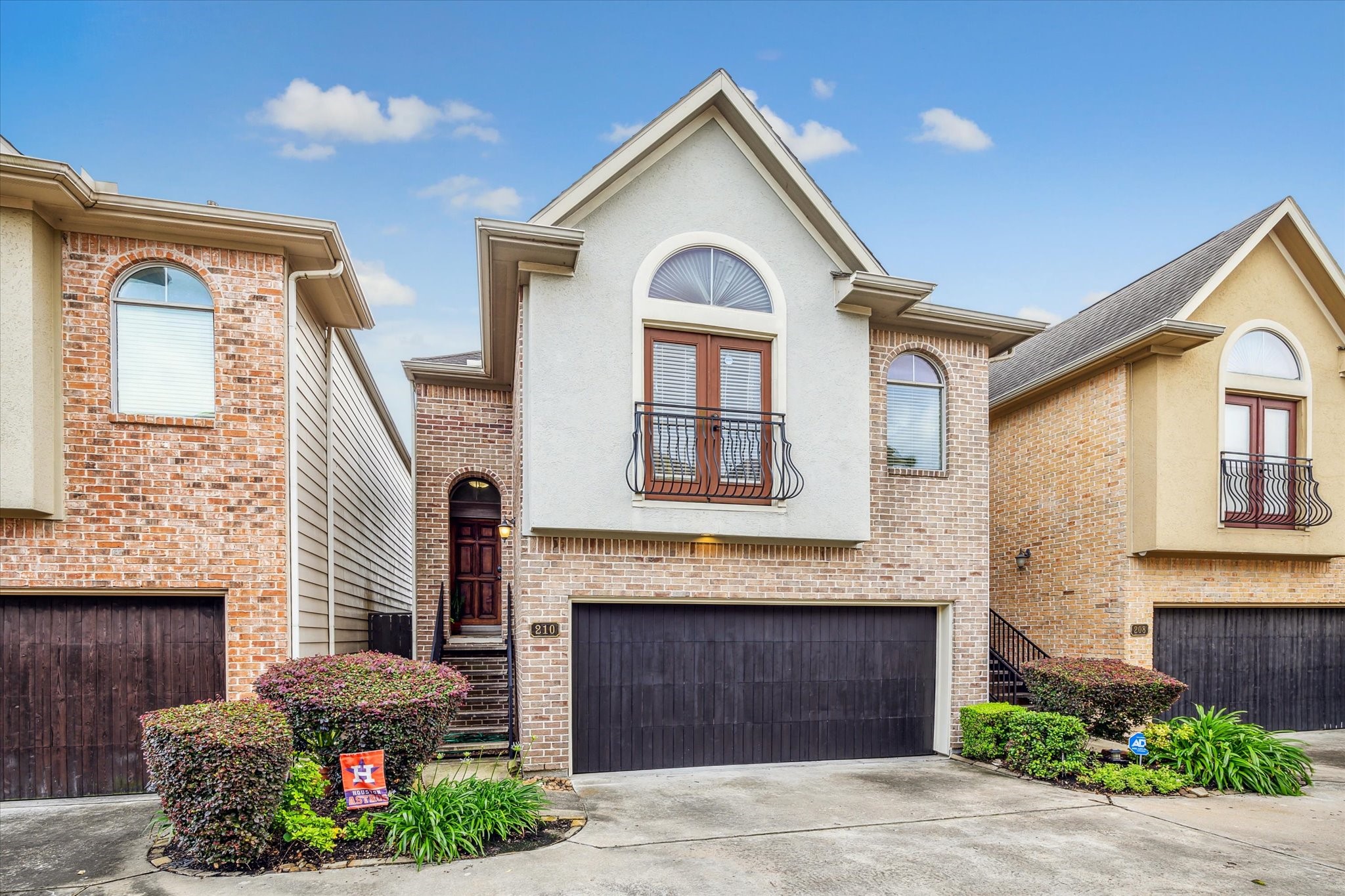 210 Grove Street Houston, TX 77020 - Photo 28 of 28 a front view of a house with a yard and garage