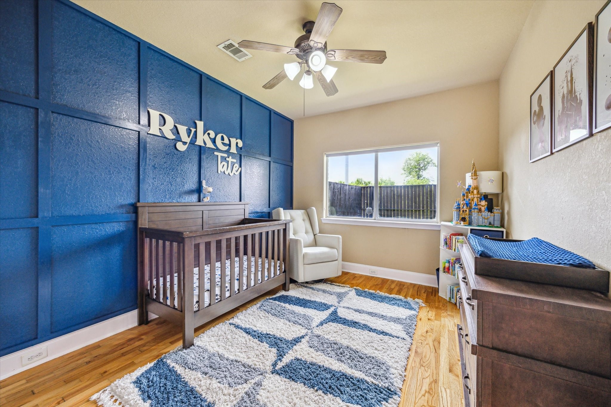 210 Grove Street Houston, TX 77020 - Photo 17 of 28 a bedroom with furniture and a window