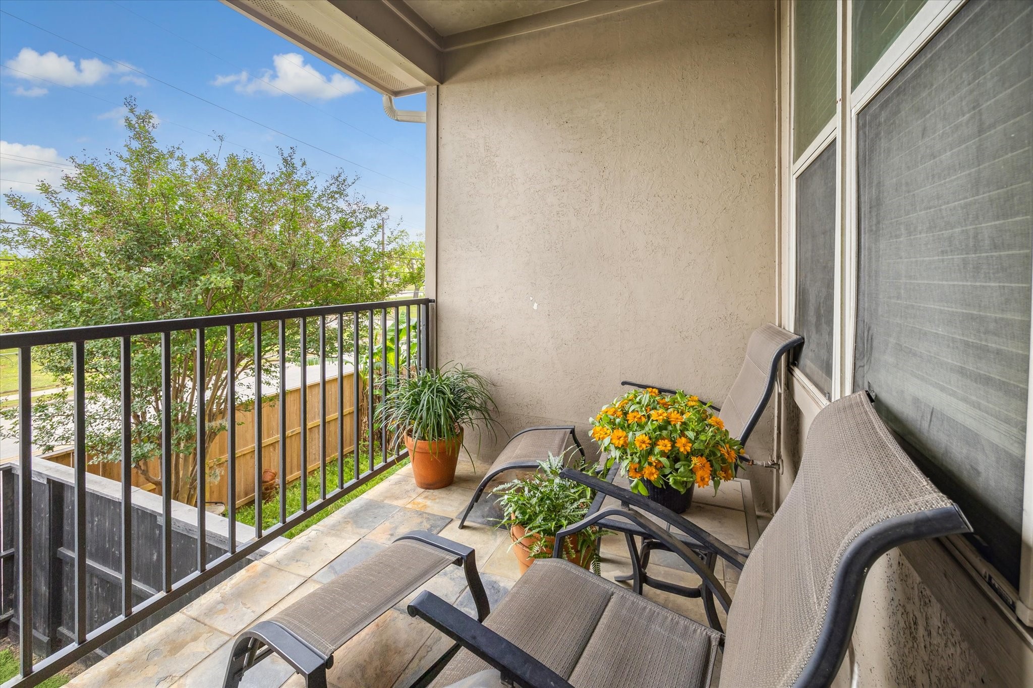210 Grove Street Houston, TX 77020 - Photo 22 of 28 a balcony with wooden floor
