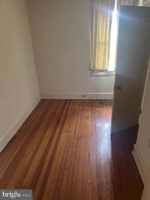 116 North Main Street Hatfield, PA 19440 - Photo 9 of 23 an empty room with wooden floor and windows