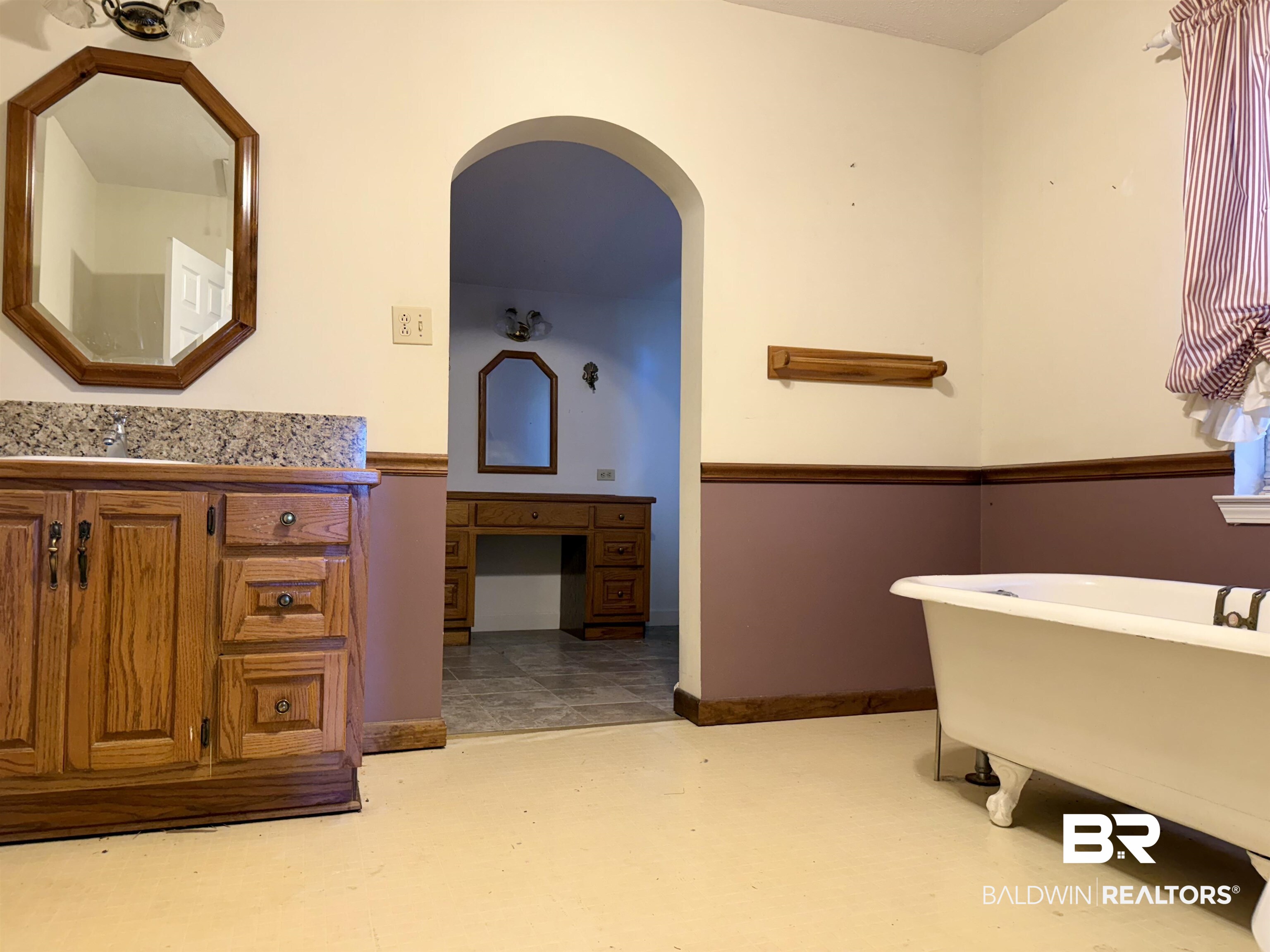 2651 Jay Road Brewton, AL 36426 - Photo 13 of 20 Bathroom with vanity and a freestanding tub