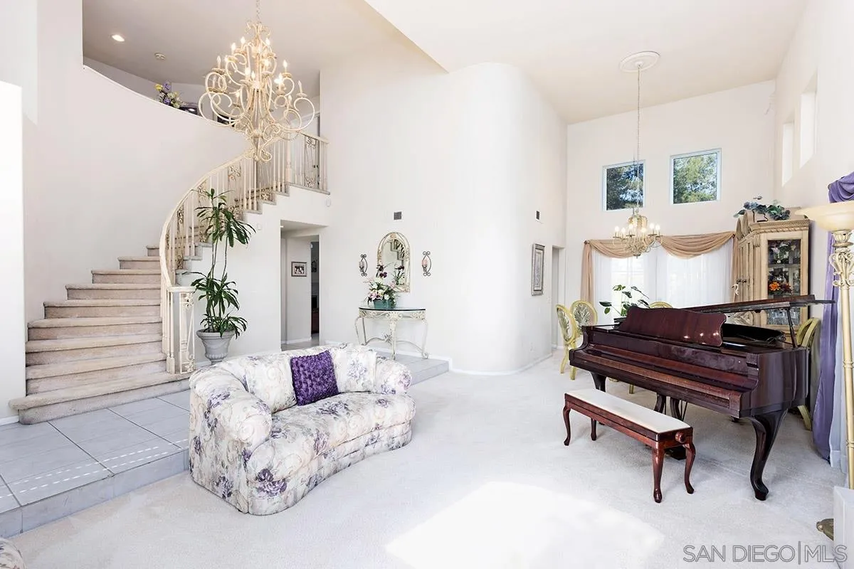 1690 West 11th Avenue Escondido, CA 92029 - Photo 15 of 25 a living room with furniture and a chandelier