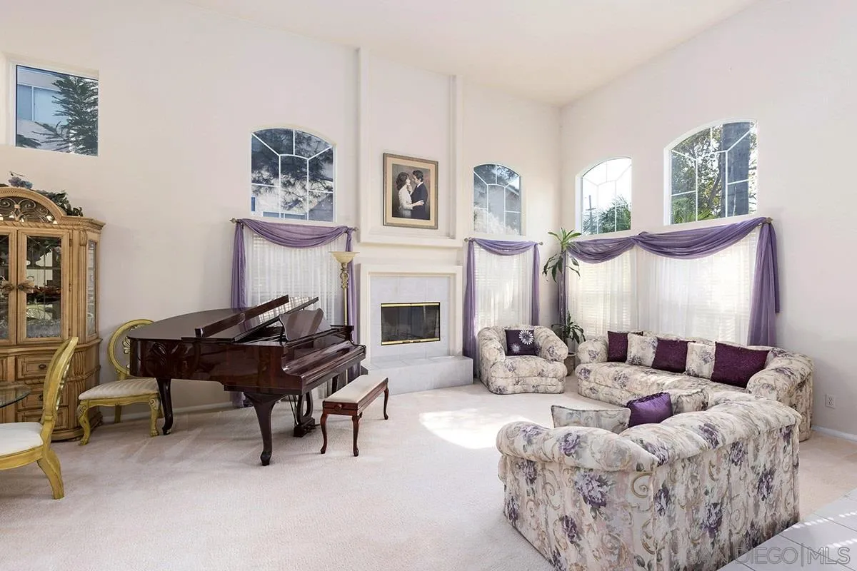 1690 West 11th Avenue Escondido, CA 92029 - Photo 4 of 25 a living room with furniture and a fireplace