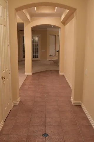 an empty room with a bathroom