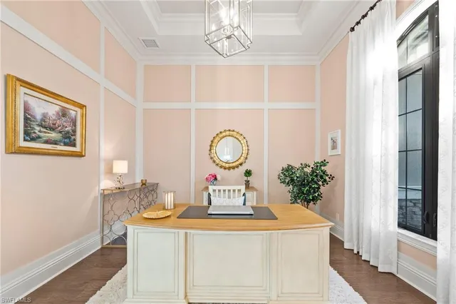 a view of a hallway to rooms and wooden floor