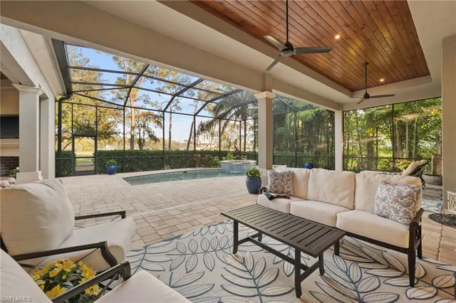 a outdoor space with patio the couches and a dining table with the garden view