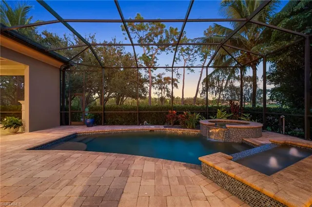 a lobby with furniture and flat screen tv