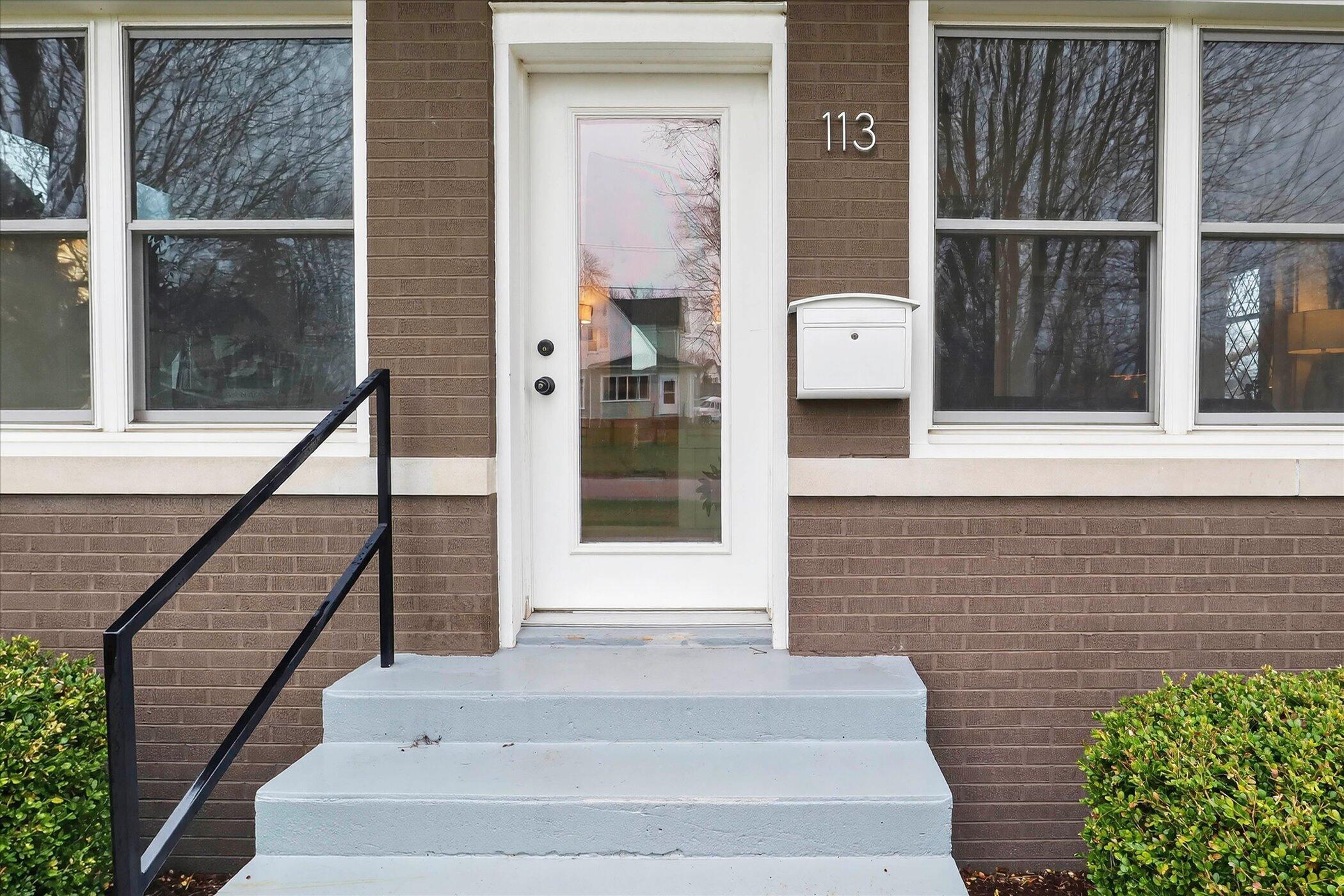 113 East Locust Street Three Oaks, MI 49128 - Photo 2 of 39 Exterior Front Entry