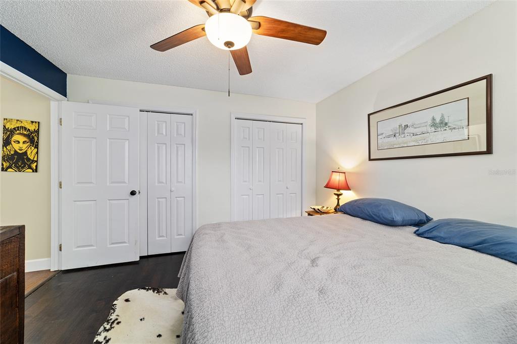 5030 Southeast 3rd Place Ocala, FL 34471 - Photo 35 of 45 a bedroom with a bed and cabinets