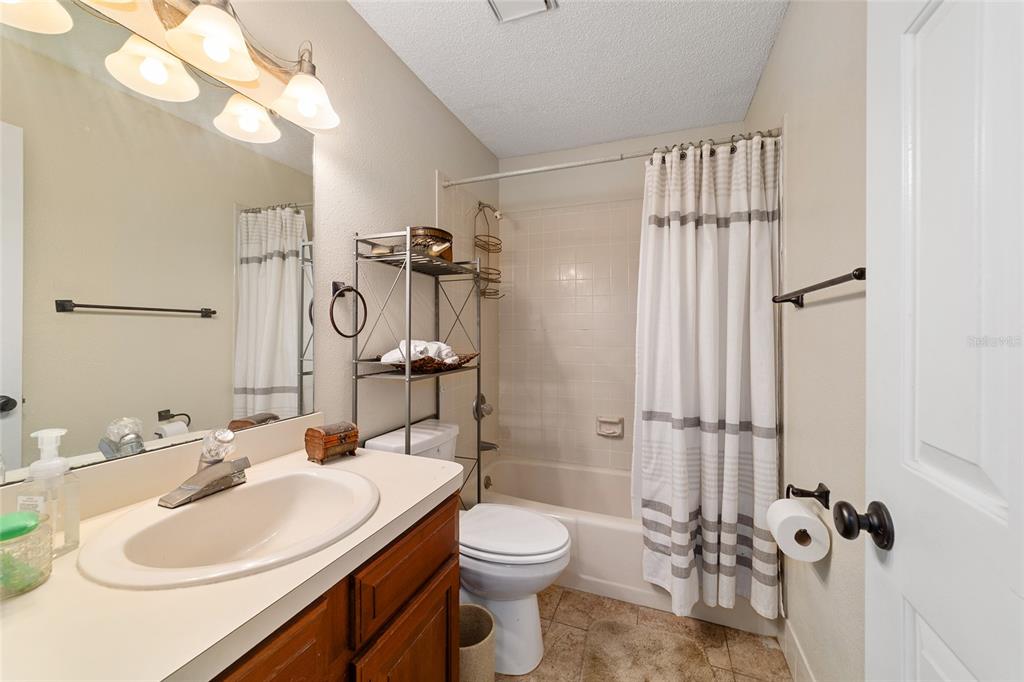 5030 Southeast 3rd Place Ocala, FL 34471 - Photo 36 of 45 a bathroom with a sink toilet and shower