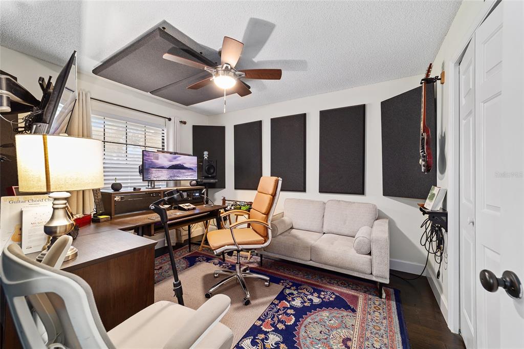 5030 Southeast 3rd Place Ocala, FL 34471 - Photo 37 of 45 a living room with furniture and a flat screen tv
