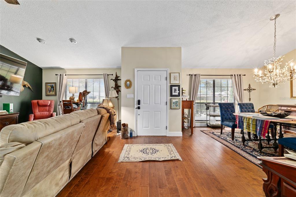 5030 Southeast 3rd Place Ocala, FL 34471 - Photo 6 of 45 a living room with furniture and a flat screen tv