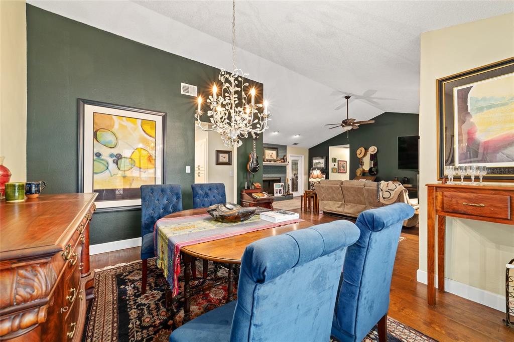 5030 Southeast 3rd Place Ocala, FL 34471 - Photo 9 of 45 a view of a dining room with furniture window and wooden floor