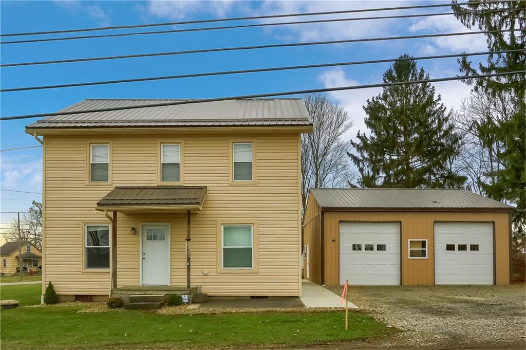 186 Tippecanoe Road Knox, PA 16232 - Photo 1 of 42 a front view of a house with a yard