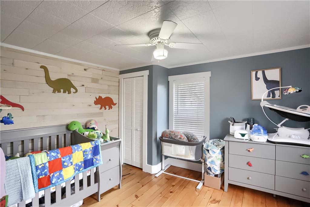 186 Tippecanoe Road Knox, PA 16232 - Photo 21 of 42 a bedroom with furniture a baby crib and a dresser