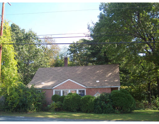 650 County Road Holyoke, MA 01040 - Photo 1 of 14 an aerial view of house with yard and trees in the background