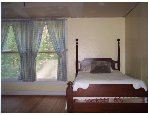 650 County Road Holyoke, MA 01040 - Photo 13 of 14 a bedroom with a large bed and a window